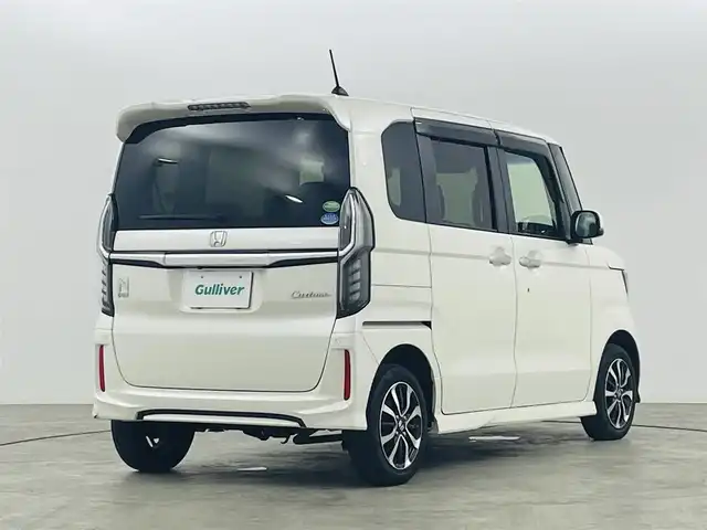 ホンダ Ｎ ＢＯＸ カスタム G L ホンダセンシング 福島県 2018(平30)年 6.2万km プレミアムホワイトパールⅡ 4WD/ホンダセンシング/・衝突被害軽減ブレーキ/・誤発進抑制/・車線維持支援システム/・アダプティブクルーズコントロール/・オートハイビーム/・前後コーナーセンサー/メモリナビ/型番：AVIC-RZ700/・AM/FM/CD/DVD/BT/フルセグTV/・バックカメラ/・ETC/パワースライドドア/プッシュスタート/・スマートキー/・スペアキー/チップアップ＆ダイブダウン機構付スライドリアシート/・シートヒーター/LEDヘッドライト/・オートライト/・フォグランプ/ヒーテッドドアミラー/アイドリングストップ