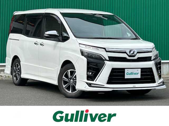 トヨタ ヴォクシー ZS 煌Ⅱ 宮城県 2020(令2)年 6.8万km ホワイトパールクリスタルシャイン モデリスタエアロ（F/S/R）/モデリスタマフラーカッター/セーフティセンス/・プリクラッシュセーフティ/・レーンディパーチャーアラート/・オートマチックハイビーム/先行車発進告知機能/インテリジェントクリアランスソナー/アルパイン12.8インチフリップダウンモニター/アルパイン11インチナビ（EX11NX）/・CD/DVD/・Bluetooth/・フルセグTV/バックカメラ/ビルトインETC/両側パワースライドドア/革調シートカバー/社外シフトノブ/革巻きステアリング/クルーズコントロール/LEDヘッドランプ/フォグランプ/オートライト/スマートキー＆プッシュスタート/電動格納ミラー/純正16インチAW/フロアマット/ドアバイザー/Wエアバッグ