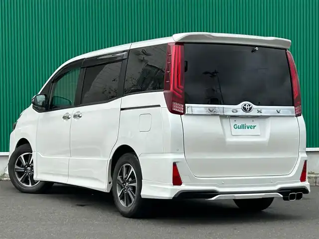 トヨタ ヴォクシー ZS 煌Ⅱ 宮城県 2020(令2)年 6.8万km ホワイトパールクリスタルシャイン モデリスタエアロ（F/S/R）/モデリスタマフラーカッター/セーフティセンス/・プリクラッシュセーフティ/・レーンディパーチャーアラート/・オートマチックハイビーム/先行車発進告知機能/インテリジェントクリアランスソナー/アルパイン12.8インチフリップダウンモニター/アルパイン11インチナビ（EX11NX）/・CD/DVD/・Bluetooth/・フルセグTV/バックカメラ/ビルトインETC/両側パワースライドドア/革調シートカバー/社外シフトノブ/革巻きステアリング/クルーズコントロール/LEDヘッドランプ/フォグランプ/オートライト/スマートキー＆プッシュスタート/電動格納ミラー/純正16インチAW/フロアマット/ドアバイザー/Wエアバッグ