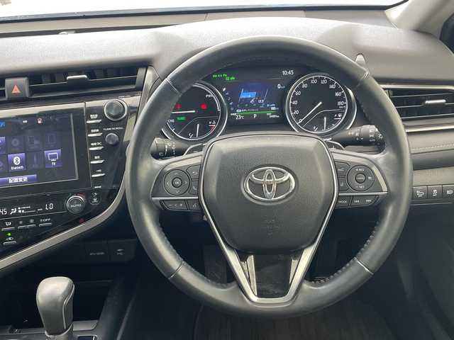 トヨタ カムリ WS 沖縄県 2019(令1)年 3.4万km シルバーM 禁煙車/純正SDナビ/（AM/FM/Bluetooth/CD/DVD/AUX）/フルセグTV/バックカメラ/ブラインドスポットモニター/レーンキープアシスト/純正ドライブレコーダー/クルーズコントロール（追従走行有り）/運転席パワーシート/ハーフレザーシート/パドルシフト/オートハイビーム/スマートキー/純正アルミホイール