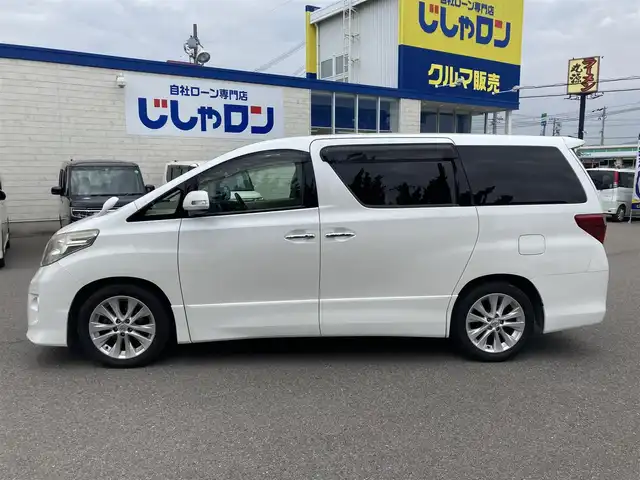 トヨタ アルファード 350S Cパッケージ 和歌山県 2010(平22)年 9.9万km ホワイトパールクリスタルシャイン (株)IDOMが運営する【じしゃロン和歌山店】の自社ローン専用車両になります。こちらは現金またはオートローンご利用時の価格です。自社ローンご希望の方は別途その旨お申付け下さい/【じしゃロン個店占有の為　落札禁止】/純正ナビ/フリップダウンモニター/両側パワースライドドア/パワーシート/シートカバー/オットマン/電動リアゲート/クルーズコントロール/純正18インチアルミホイール/純正フロアマット/横滑り防止装置/前後コーナーセンサー/ETC/カーテンエアバッグ/プッシュスタート/スマートキー