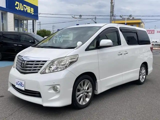 トヨタ アルファード 350S Cパッケージ 和歌山県 2010(平22)年 9.9万km ホワイトパールクリスタルシャイン (株)IDOMが運営する【じしゃロン和歌山店】の自社ローン専用車両になります。こちらは現金またはオートローンご利用時の価格です。自社ローンご希望の方は別途その旨お申付け下さい/【じしゃロン個店占有の為　落札禁止】/純正ナビ/フリップダウンモニター/両側パワースライドドア/パワーシート/シートカバー/オットマン/電動リアゲート/クルーズコントロール/純正18インチアルミホイール/純正フロアマット/横滑り防止装置/前後コーナーセンサー/ETC/カーテンエアバッグ/プッシュスタート/スマートキー