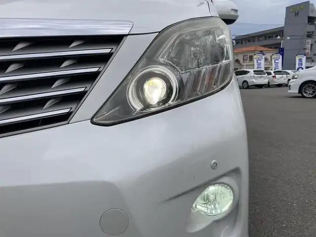 トヨタ アルファード 350S Cパッケージ 和歌山県 2010(平22)年 9.9万km ホワイトパールクリスタルシャイン (株)IDOMが運営する【じしゃロン和歌山店】の自社ローン専用車両になります。こちらは現金またはオートローンご利用時の価格です。自社ローンご希望の方は別途その旨お申付け下さい/【じしゃロン個店占有の為　落札禁止】/純正ナビ/フリップダウンモニター/両側パワースライドドア/パワーシート/シートカバー/オットマン/電動リアゲート/クルーズコントロール/純正18インチアルミホイール/純正フロアマット/横滑り防止装置/前後コーナーセンサー/ETC/カーテンエアバッグ/プッシュスタート/スマートキー