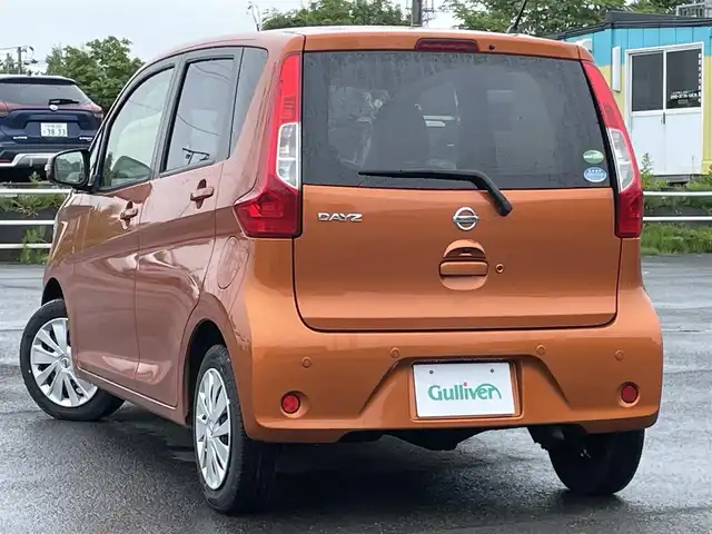日産 デイズ X 道央・札幌 2018(平30)年 5万km プレミアムサンシャインオレンジ ４WD/純正オーディオ/AM/FM/CD/AUX/衝突被害軽減ブレーキ/横滑り防止装置/クリアランスソナー/マルチアラウンドモニター/アイドリングストップ/D席シートヒーター/ステアリングリモコン/プッシュスタート/スマートキー/ハロゲンヘッドライト/ヘッドライトレベライザー/電動格納ミラー/ウィンカーミラー/純正フロアマット/スペアキー/鉄チンホイール付冬タイヤ積込/155/65/R14/2024年/山7mm