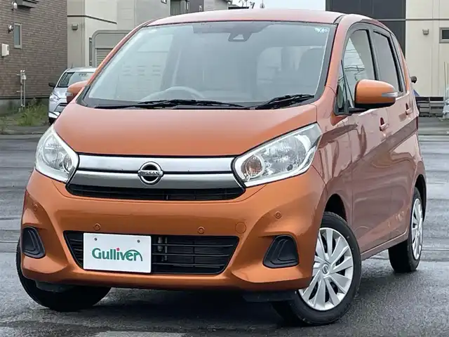 日産 デイズ X 道央・札幌 2018(平30)年 5万km プレミアムサンシャインオレンジ ４WD/純正オーディオ/AM/FM/CD/AUX/衝突被害軽減ブレーキ/横滑り防止装置/クリアランスソナー/マルチアラウンドモニター/アイドリングストップ/D席シートヒーター/ステアリングリモコン/プッシュスタート/スマートキー/ハロゲンヘッドライト/ヘッドライトレベライザー/電動格納ミラー/ウィンカーミラー/純正フロアマット/スペアキー/鉄チンホイール付冬タイヤ積込/155/65/R14/2024年/山7mm