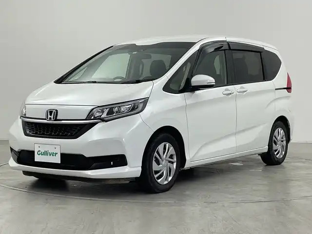 ホンダ フリード G ホンダセンシング 群馬県 2022(令4)年 2万km プラチナホワイトパール 純正９型ナビ　純正１２．８型後席モニター　バックカメラ　フルセグＴＶ　両側電動スライドドア　アダプティブクルーズコントロール　衝突被害軽減ブレーキ　レーンアシスト　ＬＥＤヘッドライト　ＥＴＣ　禁煙車