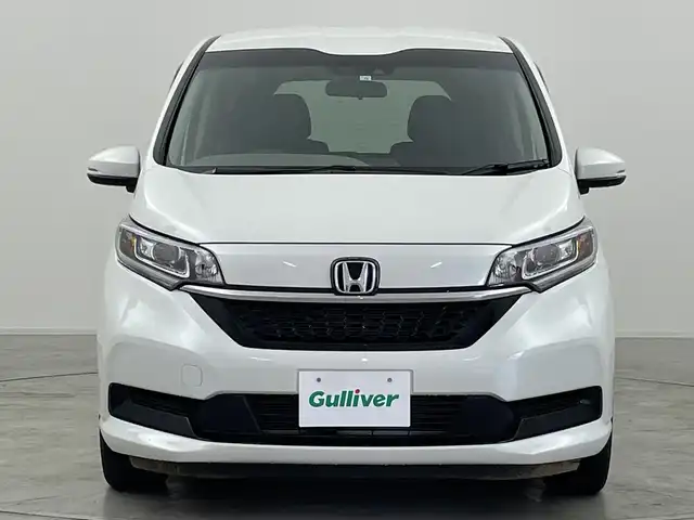 ホンダ フリード G ホンダセンシング 群馬県 2022(令4)年 2万km プラチナホワイトパール 純正９型ナビ　純正１２．８型後席モニター　バックカメラ　フルセグＴＶ　両側電動スライドドア　アダプティブクルーズコントロール　衝突被害軽減ブレーキ　レーンアシスト　ＬＥＤヘッドライト　ＥＴＣ　禁煙車