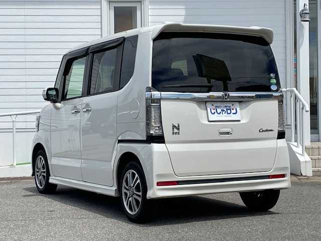 ホンダ Ｎ ＢＯＸ カスタム G Lパッケージ 富山県 2016(平28)年 9.4万km プレミアムホワイトパールⅡ (株)IDOMが運営する【じしゃロン富山店】の自社ローン専用車両になります。こちらは現金またはオートローンご利用時の価格です。自社ローンご希望の方は別途その旨お申し付け下さい/Stradaナビ/フルセグ/SD/CD/DVD/USB/Bluetooth/バックカメラ/片側パワースライドドア/ビルトインETC/横滑り防止/ステアリングスイッチ/リア席サンシェード/純正１４インチアルミホイール/HIDヘッドライト/オートライト/フォグランプ/ドアバイザー/プッシュスタート/スマートキー/スペアキー１本