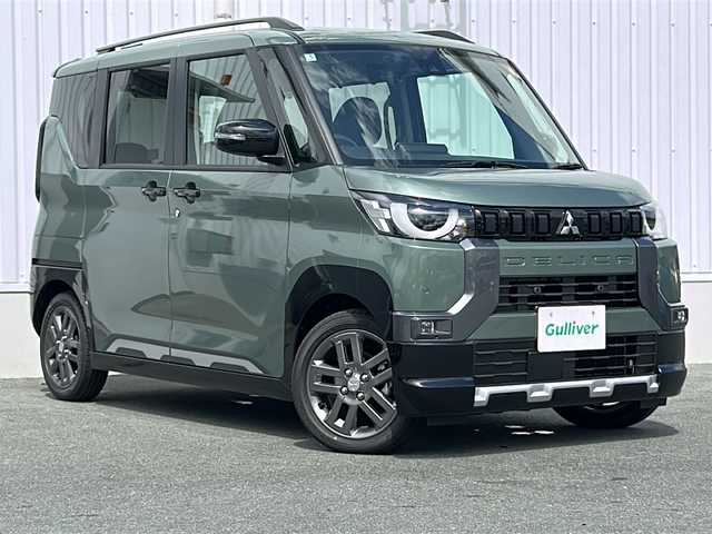 三菱 デリカミニ T プレミアム 三重県 2025(令7)年 0.1千km 緑 登録済未使用車　/純正9型ディスプレイオーディオ　/全周囲　/両側パワースライドドア　/デジタルインナーミラー/前席シートヒーター/スペアキー　/マイパイロット　/前後コーナーセンサー　/レーダークルーズコントロール/レーンキープアシスト/オートホールド/パドルシフト/ＵＳＢ給電　/ステアリングヒーター/ステアリングスイッチ/革巻きステアリング　/ダウンヒルアシストコントロール　/ＬＥＤヘッドライト/ヘッドライトレベライザー/オートライト/オートハイビーム　/ハーフレザーシート/電動格納ミラー/禁煙車