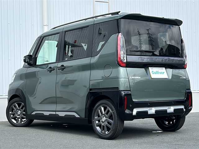 三菱 デリカミニ T プレミアム 三重県 2025(令7)年 0.1千km 緑 登録済未使用車　/純正9型ディスプレイオーディオ　/全周囲　/両側パワースライドドア　/デジタルインナーミラー/前席シートヒーター/スペアキー　/マイパイロット　/前後コーナーセンサー　/レーダークルーズコントロール/レーンキープアシスト/オートホールド/パドルシフト/ＵＳＢ給電　/ステアリングヒーター/ステアリングスイッチ/革巻きステアリング　/ダウンヒルアシストコントロール　/ＬＥＤヘッドライト/ヘッドライトレベライザー/オートライト/オートハイビーム　/ハーフレザーシート/電動格納ミラー/禁煙車