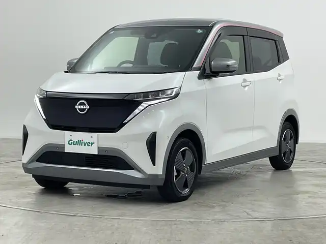 日産 サクラ G 群馬県 2024(令6)年 0.9万km チタニウムグレーM/シルキーホワイト 純正９型ナビ　全周囲カメラ　アダプティブクルーズコントロール　レーンキープアシスト　衝突被害軽減ブレーキ　オートマチックハイビーム　純正ドライブレコーダー　シートヒーター　ＥＴＣ２．０　ＬＥＤ　禁煙車