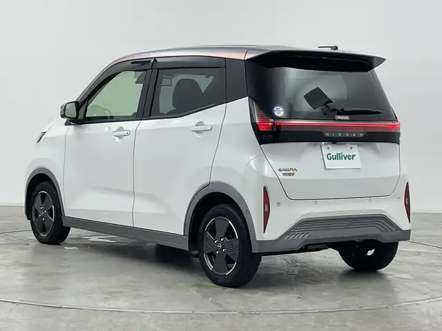 日産 サクラ G 群馬県 2024(令6)年 0.9万km チタニウムグレーM/シルキーホワイト 純正９型ナビ　全周囲カメラ　アダプティブクルーズコントロール　レーンキープアシスト　衝突被害軽減ブレーキ　オートマチックハイビーム　純正ドライブレコーダー　シートヒーター　ＥＴＣ２．０　ＬＥＤ　禁煙車