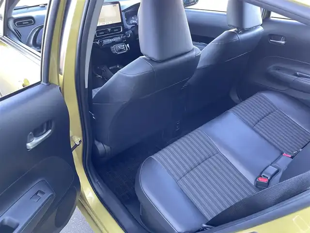 トヨタ アクア Z 東京都 2022(令4)年 0.9万km ブラスゴールドメタリック 純正10.5インチ大型ナビ/・AppleCarplay/・AndroidAuto/・Miracast/・Bluetooth接続/・フルセグTV/Toyota Safety Sense/・PCS(プリクラッシュセーフティー)/・LTA(レーントレーシングアシスト)/・RSA(ロードサインアシスト)/レーダークルーズコントロール（全車速追従機能付き）/BSM(ブラインドスポットモニター)/RCTA(リアクロストラフィックアラート)/PKSB(パーキングサポートブレーキ)/AHB(オートマチックハイビーム)/先行車発進告知機能/クリアランスソナー/ドライブレコーダ（F-CAM））/全方位モニター/ビルトインETC/レーダー探知（Yupiteru））/純正フロアマット/純正15インチアルミホイール/D席パワーシート/シートヒーター/ハンドルヒーター/100V充電/スマートキー/スペアキー/４WD/保証書/取扱説明書