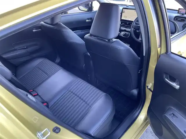 トヨタ アクア Z 東京都 2022(令4)年 0.9万km ブラスゴールドメタリック 純正10.5インチ大型ナビ/・AppleCarplay/・AndroidAuto/・Miracast/・Bluetooth接続/・フルセグTV/Toyota Safety Sense/・PCS(プリクラッシュセーフティー)/・LTA(レーントレーシングアシスト)/・RSA(ロードサインアシスト)/レーダークルーズコントロール（全車速追従機能付き）/BSM(ブラインドスポットモニター)/RCTA(リアクロストラフィックアラート)/PKSB(パーキングサポートブレーキ)/AHB(オートマチックハイビーム)/先行車発進告知機能/クリアランスソナー/ドライブレコーダ（F-CAM））/全方位モニター/ビルトインETC/レーダー探知（Yupiteru））/純正フロアマット/純正15インチアルミホイール/D席パワーシート/シートヒーター/ハンドルヒーター/100V充電/スマートキー/スペアキー/４WD/保証書/取扱説明書