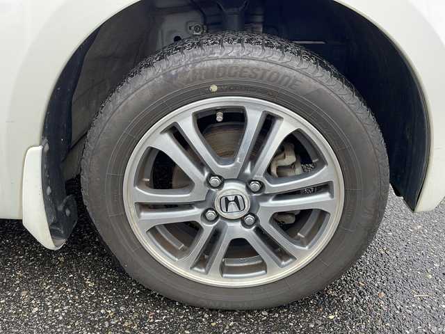 ホンダ Ｎ ＢＯＸ G Lパッケージ 新潟県 2015(平27)年 5.4万km プレミアムホワイトパールⅡ 4WD/メモリナビ:VXM-155VSi/（Bluetooth/FM/AM/ワンセグ）/バックカメラ/D/N席シートヒーター/両側パワースライドドア/純正14インチアルミホイール/プッシュスタート/ドアバイザー/社外ETC/HIDヘッドライト/オートライト/オートエアコン/衝突軽減ブレーキ