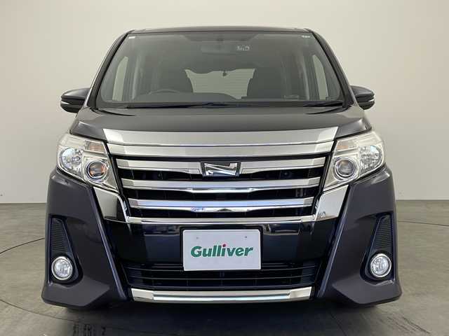 トヨタ ノア Si 兵庫県 2015(平27)年 5.4万km ダークバイオレットマイカメタリック ・ワンオーナー車/・カロッツェリアナビ&TV&BT&CD&DVD/・カロッツェリアフリップダウンモニター/・両側パワースライドドア/・前後ドライブレコーダー/・ビルトインETC/・バックカメラ/・社外18インチアルミホイール/・純正フロアマット/・アイドリングストップ/・LEDライト/・インテリアイルミネーション/・横滑り防止/・アイドリングストップ/・スペアキー
