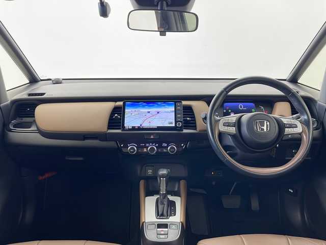 ホンダ フィット e:HEVリュクス 秋田県 2020(令2)年 4.9万km プレミアムグラマラスブロンズP 4WD/純正ナビ/(FM/AM/フルセグTV/Bluetooth/CD/DCD)/バックカメラ/ハーフレザーシート/ホンダセンシング/衝突軽減装置/レーンキープアシスト/コーナーセンサー/クルーズコントロール/横滑り防止装置/アイドリングストップ/オートブレーキホールド/ワイパーデアイサー/ビルトインETC/ドライブレコーダー/ステアリングリモコン/前席シートヒーター/ドアミラーヒーター/ステアリングヒーター/LEDヘッドライト/フォグランプ/オートライト/置くだけ充電/純正アルミホイール/純正フロアマット/プッシュスタート/スマートキー