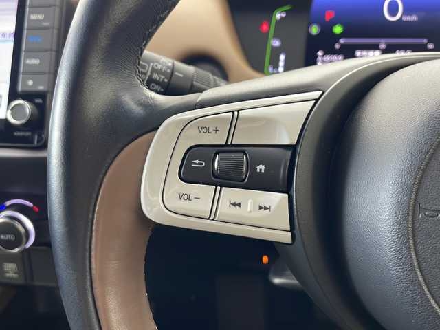 ホンダ フィット e:HEVリュクス 秋田県 2020(令2)年 4.9万km プレミアムグラマラスブロンズP 4WD/純正ナビ/(FM/AM/フルセグTV/Bluetooth/CD/DCD)/バックカメラ/ハーフレザーシート/ホンダセンシング/衝突軽減装置/レーンキープアシスト/コーナーセンサー/クルーズコントロール/横滑り防止装置/アイドリングストップ/オートブレーキホールド/ワイパーデアイサー/ビルトインETC/ドライブレコーダー/ステアリングリモコン/前席シートヒーター/ドアミラーヒーター/ステアリングヒーター/LEDヘッドライト/フォグランプ/オートライト/置くだけ充電/純正アルミホイール/純正フロアマット/プッシュスタート/スマートキー