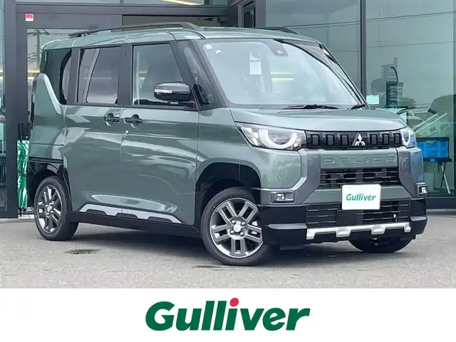 三菱 デリカミニ T プレミアム 東京都 2025(令7)年 0.1千km 緑 届出済未使用車/純正9インチディスプレイオーディオ/アラウンドビューモニター/マイパイロット/両側パワースライドドア/デジタルインナーミラー/ハーフレザーシート/シートヒーター/ステアリングヒーター/アイドリングストップ/コーナーセンサー/スマートキー/純正15インチアルミホイール