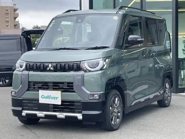 三菱 デリカミニ T プレミアム 東京都 2025(令7)年 0.1千km 緑 届出済未使用車/純正9インチディスプレイオーディオ/アラウンドビューモニター/マイパイロット/両側パワースライドドア/デジタルインナーミラー/ハーフレザーシート/シートヒーター/ステアリングヒーター/アイドリングストップ/コーナーセンサー/スマートキー/純正15インチアルミホイール