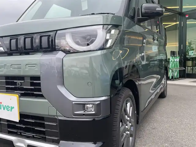 三菱 デリカミニ T プレミアム 東京都 2025(令7)年 0.1千km 緑 届出済未使用車/純正9インチディスプレイオーディオ/アラウンドビューモニター/マイパイロット/両側パワースライドドア/デジタルインナーミラー/ハーフレザーシート/シートヒーター/ステアリングヒーター/アイドリングストップ/コーナーセンサー/スマートキー/純正15インチアルミホイール