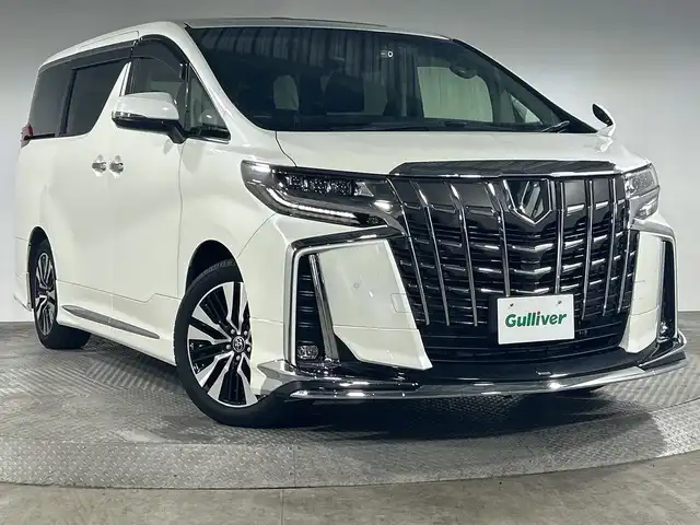 トヨタ アルファード S Cパッケージ 神奈川県 2022(令4)年 3.3万km ホワイトパールクリスタルシャイン トヨタセーフティセンス/純正メーカーナビ/・BT/フルセグTV/MiraCast/AM/FM/バックカメラ/純正フリップダウンモニター/デジタルインナーミラー/ツインムーンルーフ/BSM/レザーシート/パワーシート(D/N/2列目)/シートヒーター(D/N)/ベンチレーション(D/N)/メモリシート(D)/ビルトインETC/前後ドライブレコーダー/電動サイドブレーキ/オートブレーキホールド/電動リアゲート/ウッドコンビ調ステアリング/ステアリングスイッチ/ステアリングヒーター/Autoライト/2列目サンシェード/MTモード/三眼LEDヘッドライト/AFS/フォグランプ/モデリスタ(F/R)/純正フロアマット/純正ドアバイザー/純正18インチアルミホイール