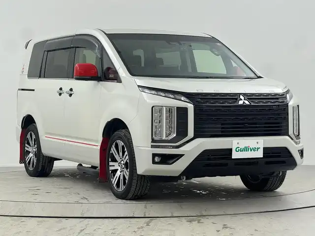 三菱 デリカＤ：５ P 熊本県 2020(令2)年 5.7万km ウォームホワイトパール 禁煙車/衝突被害軽減ブレーキ/社外11型フローティングナビTV/（アルパイン/XF11NX/CD/DVD/Bluetooth/フルセグTV)/社外バックカメラ/社外前後ドライブレコーダー/社外ETC/社外JAOSマッドガード/純正ラリーアート/リアスポイラー/純正エンジンスターター/純正ドアハンドルイルミ/純正LEDオートライト/純正LEDフォグ/純正18インチアルミ/純正フロアマット/両側電動スライドドア/パワーバックドア/アダプティブクルーズコントロール/レーンディパーチャーアラート/ブラインドスポットモニター/クリアランスソナー/電子パーキング/オートホールド/運転席パワーシート/前席シートヒーター/パドルシフト/オートエアコン/リアヒーター/本革巻ハンドル/オートステップ/スマートキー/プッシュエンジンスタート/新車時保証書/取扱い説明書