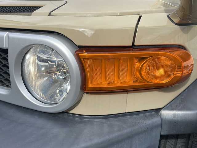 トヨタ ＦＪクルーザー 広島県 2015(平27)年 9.1万km ベージュ/ホワイト /登録時走行距離/　　　　　　　90199キロ/4WD/純正ナビ/バックカメラ/地デジ/ETC/新車時整備手帳/　　【保証書】/取扱説明書/