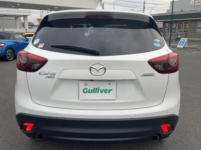 マツダ ＣＸ－５ 25S Lパッケージ 広島県 2015(平27)年 2.5万km クリスタルホワイトパールマイカ ワンオーナー/メモリナビ/（Bluetooth/USB/CD/DVD/AUX）/バックカメラ/アイドリングストップ/クルーズコントロール（追従有）/ドアバイザー/プッシュスタート/ビルドインETC/LEDヘッドライト/衝突軽減ブレーキ/レーンキープアシスト