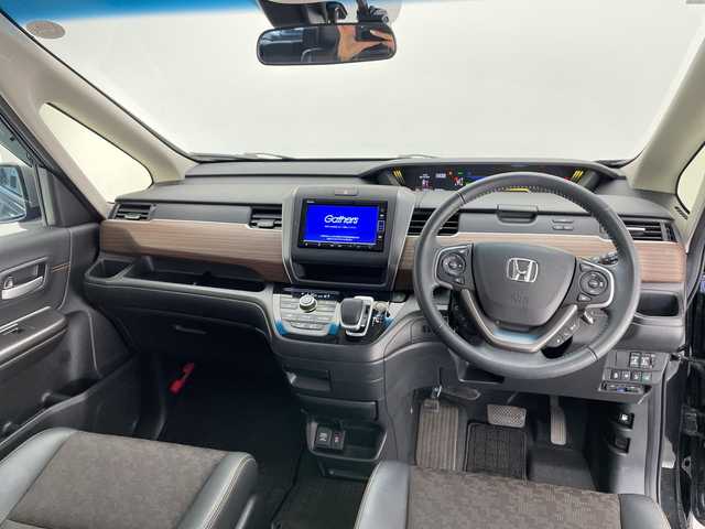 ホンダ フリード ハイブリット クロスター 長野県 2023(令5)年 2.9万km クリスタルブラックパール 純正メモリナビ（型番VXM-234VFi）/（フルセグTV＆CD＆DVD＆SD＆BL＆USB＆iPod＆AUX＆FM・AM）/バックカメラ/ホンダセンシング/・クルーズコントロール（追従あり）/・レーンキープアシスト/・衝突被害軽減システム/・クリアランスソナー/純正エンジンスターター/ビルトインETC/ドライブレコーダー（前後）/両側パワースライドドア/ワイパーデアイサー/LEDヘッドライト/フォグランプ/オートライト/シートヒーター（前席）/2列目サンシェード/純正フロアマット/15インチ純正アルミホイール/ドアバイザー/スマートキー