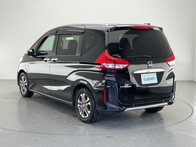 ホンダ フリード ハイブリット クロスター 長野県 2023(令5)年 2.9万km クリスタルブラックパール 純正メモリナビ（型番VXM-234VFi）/（フルセグTV＆CD＆DVD＆SD＆BL＆USB＆iPod＆AUX＆FM・AM）/バックカメラ/ホンダセンシング/・クルーズコントロール（追従あり）/・レーンキープアシスト/・衝突被害軽減システム/・クリアランスソナー/純正エンジンスターター/ビルトインETC/ドライブレコーダー（前後）/両側パワースライドドア/ワイパーデアイサー/LEDヘッドライト/フォグランプ/オートライト/シートヒーター（前席）/2列目サンシェード/純正フロアマット/15インチ純正アルミホイール/ドアバイザー/スマートキー
