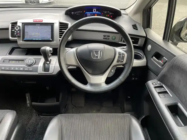 ホンダ フリード ハイブリット ジャストセレクション 埼玉県 2012(平24)年 8.7万km プレミアムブラキッシュパール /ワンオーナー//社外メモリナビ//フルセグTV//バックカメラ//CD/DVD/Bluetooth//両側パワースライドドア//クルーズコントロール//ETC//スマートキー//キセノン//ハーフレザーシート//Wエアバッグ//ABS//横滑り防止装置//ドライブレコーダー//オートライト//プライバシーガラス//無限フロントグリル//純正15インチAW//新車時保証書//取扱説明書//ナビ取説