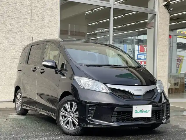 ホンダ フリード ハイブリット ジャストセレクション 埼玉県 2012(平24)年 8.7万km プレミアムブラキッシュパール /ワンオーナー//社外メモリナビ//フルセグTV//バックカメラ//CD/DVD/Bluetooth//両側パワースライドドア//クルーズコントロール//ETC//スマートキー//キセノン//ハーフレザーシート//Wエアバッグ//ABS//横滑り防止装置//ドライブレコーダー//オートライト//プライバシーガラス//無限フロントグリル//純正15インチAW//新車時保証書//取扱説明書//ナビ取説