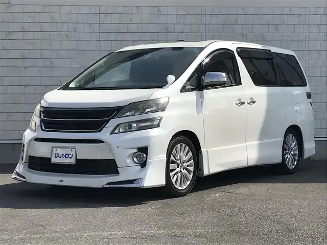 トヨタ ヴェルファイア 2．4Z 栃木県 2012(平24)年 14.3万km ホワイトパールクリスタルシャイン 株)IDOMが運営する【じしゃロン小山店】の自社ローン専用車両になります。こちらは現金またはオートローンご利用時の価格です。自社ローンご希望の方は別途その旨お申付け下さい//禁煙車/ワンオーナー/社外フルセグナビ/（CD/DVD/AM/FMラジオ）/(Bluetooth)/スマートキー/プッシュスタート/バックカメラ/ＥＴＣ/両側パワースライドドア/コーナーセンサー/サンルーフ/オットマン/ステアリングリモコン/シートカバー/電動格納ドアミラー/パワーウインドウ/防眩ミラー/シートカバー/モデリングエアロ