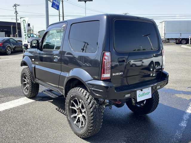 スズキ ジムニー シエラ クロスアドベンチャー 新潟県 2014(平26)年 16.4万km ブルーイッシュブラックパール3 ４WD/リフトアップ/センターデフロック/社外ナビ〈strada CN-R300D〉/フルセグTV/純正エアロパーツ〈フロント＆サイド〉/社外アルミ〈RAYS１６インチAW〉/社外マフラー〈K3〉/社外テールランプ/専用シート/バックカメラ/フォグランプ/ウィンカーミラー