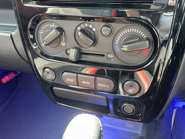 スズキ ジムニー シエラ クロスアドベンチャー 新潟県 2014(平26)年 16.4万km ブルーイッシュブラックパール3 ４WD/リフトアップ/センターデフロック/社外ナビ〈strada CN-R300D〉/フルセグTV/純正エアロパーツ〈フロント＆サイド〉/社外アルミ〈RAYS１６インチAW〉/社外マフラー〈K3〉/社外テールランプ/専用シート/バックカメラ/フォグランプ/ウィンカーミラー