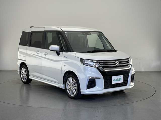 スズキ ソリオ HV MX 長野県 2023(令5)年 6.4万km ピュアホワイトP 4WD/社外メモリナビ&USB&BT/アダプティブクルーズコントロール/レーンキープアシスト/車線逸脱警報/衝突軽減ブレーキ/アイドリングストップ/片側パワースライドドア/ステアリングスイッチ/2列目サンシェード/バックカメラ/ハロゲンライト/電動格納ミラー/ドアミラーヒーター/純正15インチAW装着/純正フロアマット/プッシュスタート/スマートキー