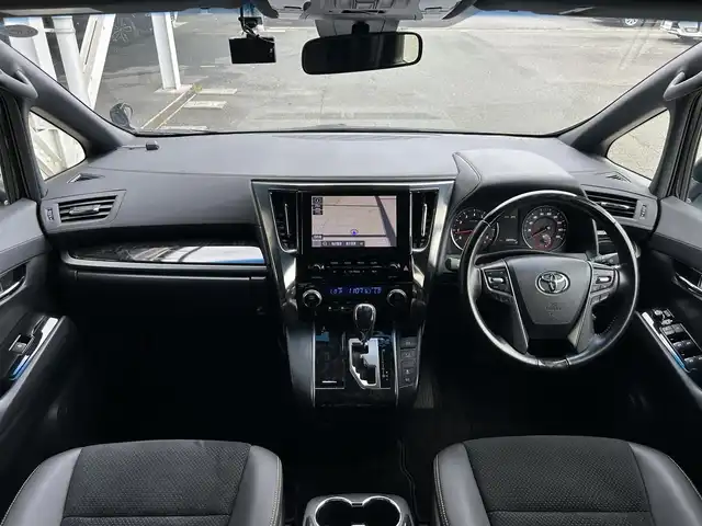 トヨタ アルファード S タイプゴールド 静岡県 2020(令2)年 2.8万km ブラック 特別仕様車/トヨタセーフティセンス/純正9型ディスプレイ/ナビ/フルセグＴＶ/ＤＶＤ再生/ＢＴオーディオ/バックカメラ/前後ドラレコ/ビルトインＥＴＣ2.0/TRDエアロ FSR/ツインムーンルーフ/純正１２．１型後席モニター/AC１００Ｖ/１００Ｗ/追従機能付クルコン/ハーフレザーシート/前後コーナーセンサー/LEDヘッドライト/オートライト/オートハイビーム/LTA（レーントレーシングアシスト）/クリアランスソナー/PKSB(パーキングサポートブレーキ)/PCS(プリクラッシュセーフティ)/オットマン/純正１８ＡＷ
