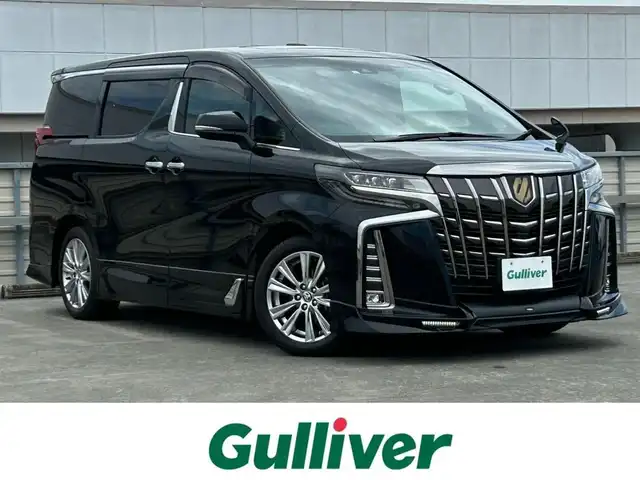 トヨタ アルファード S タイプゴールド 静岡県 2020(令2)年 2.8万km ブラック 特別仕様車/トヨタセーフティセンス/純正9型ディスプレイ/ナビ/フルセグＴＶ/ＤＶＤ再生/ＢＴオーディオ/バックカメラ/前後ドラレコ/ビルトインＥＴＣ2.0/TRDエアロ FSR/ツインムーンルーフ/純正１２．１型後席モニター/AC１００Ｖ/１００Ｗ/追従機能付クルコン/ハーフレザーシート/前後コーナーセンサー/LEDヘッドライト/オートライト/オートハイビーム/LTA（レーントレーシングアシスト）/クリアランスソナー/PKSB(パーキングサポートブレーキ)/PCS(プリクラッシュセーフティ)/オットマン/純正１８ＡＷ