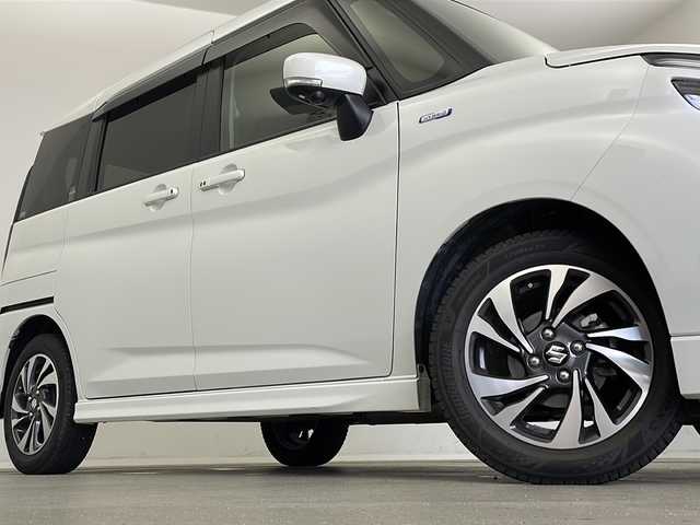 スズキ ソリオ バンディット HV MV 新潟県 2022(令4)年 3.9万km ピュアホワイトP 純正９インチメモリナビ（Bluetooth・USB・AM・FM）/両側パワースライドドア　/アラウンドビューモニター　/ヘッドアップディスプレイ　/フルセグ　/ETC２．０　/衝突被害軽減システム/レーンキープアシスト　/後方コーナーセンサー　/追従クルーズコントロール/LEDオートライト/オートマチックハイビーム/フォグランプ/前後ドラレコ/アイドリングストップ/リアサーキュレーター/スマートキー/純正フロアマット/純正１５インチアルミホイール