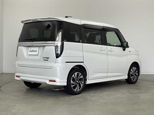 スズキ ソリオ バンディット HV MV 新潟県 2022(令4)年 3.9万km ピュアホワイトP 純正９インチメモリナビ（Bluetooth・USB・AM・FM）/両側パワースライドドア　/アラウンドビューモニター　/ヘッドアップディスプレイ　/フルセグ　/ETC２．０　/衝突被害軽減システム/レーンキープアシスト　/後方コーナーセンサー　/追従クルーズコントロール/LEDオートライト/オートマチックハイビーム/フォグランプ/前後ドラレコ/アイドリングストップ/リアサーキュレーター/スマートキー/純正フロアマット/純正１５インチアルミホイール