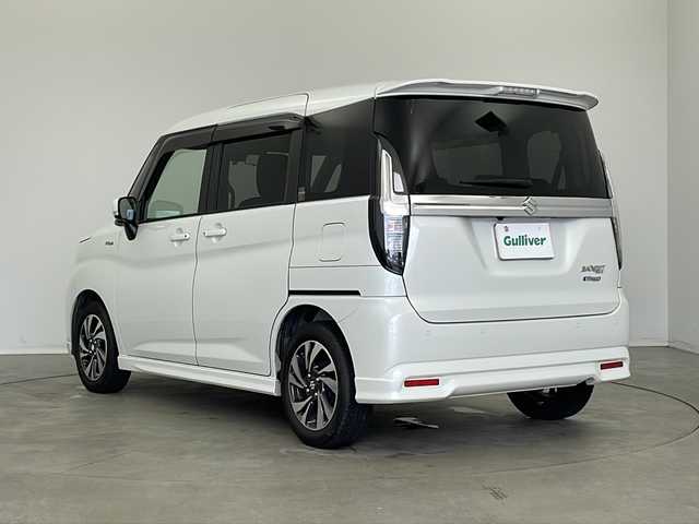 スズキ ソリオ バンディット HV MV 新潟県 2022(令4)年 3.9万km ピュアホワイトP 純正９インチメモリナビ（Bluetooth・USB・AM・FM）/両側パワースライドドア　/アラウンドビューモニター　/ヘッドアップディスプレイ　/フルセグ　/ETC２．０　/衝突被害軽減システム/レーンキープアシスト　/後方コーナーセンサー　/追従クルーズコントロール/LEDオートライト/オートマチックハイビーム/フォグランプ/前後ドラレコ/アイドリングストップ/リアサーキュレーター/スマートキー/純正フロアマット/純正１５インチアルミホイール