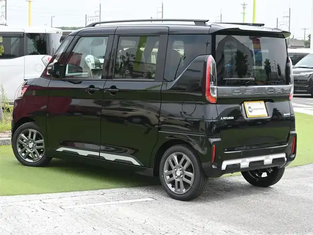 三菱 デリカミニ T プレミアム 千葉県 2025(令7)年 0.1千km アメジストブラック T　PREMIUM　9型ディスプレイオーディオ（121/330）　サイドデカール（33440）/e-Assist/・衝突被害軽減ブレーキシステム（FCM）/・車線逸脱警報システム（LDW）/・誤発進抑制機能（前進＆後退時）（UMS）/・レーダークルーズコントロールシステム（ACC）/・オートマチックハイビーム[AHB]/マイパイロット/ハンズフリー両側パワースライドドア/ハーフレザーシート/前席シートヒーター/デジタルインナーミラー/ディスプレイオーディオ/【Bluetooth接続】/【Apple CarPlay　Android Auto対応】/マルチアラウンドモニター/革巻きステアリング/ステアリングヒーター/ステアリングスイッチ/パドルシフト/LEDヘッドライト/フォグライト/ウインカーミラー/コーナーセンサー/純正15インチアルミホイル/サイド/カーテンエアバッグ/キーレスオペレーションシステム