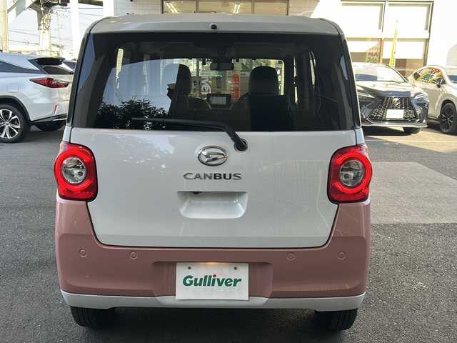 ダイハツ ムーヴ キャンバス ストライプス X 大分県 2023(令5)年 1.5万km シャイニングホワイトパール/アプリコットピンクメタリック ワンオーナー /9インチ純正SDナビ /フルセグTV /CD/DVD再生機能/バックカメラ /両側パワースライドドア /禁煙　/クリアランスソナー /2トーン /前方純正ドライブレコーダー /電動格納ミラー　/スマートキー/Wエアバッグ/オートライト