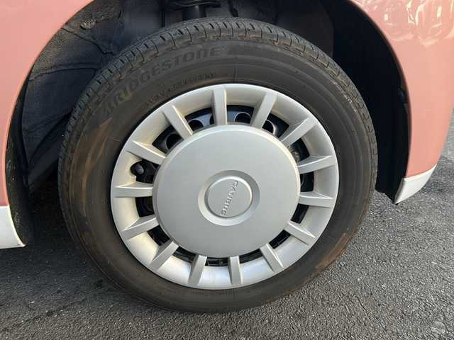 ダイハツ ムーヴ キャンバス ストライプス X 大分県 2023(令5)年 1.5万km シャイニングホワイトパール/アプリコットピンクメタリック ワンオーナー /9インチ純正SDナビ /フルセグTV /CD/DVD再生機能/バックカメラ /両側パワースライドドア /禁煙　/クリアランスソナー /2トーン /前方純正ドライブレコーダー /電動格納ミラー　/スマートキー/Wエアバッグ/オートライト