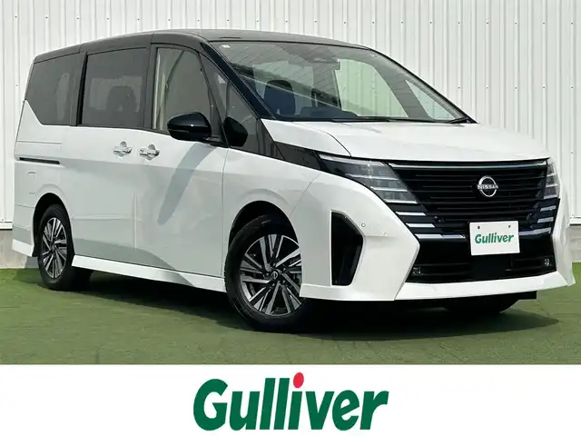 日産 セレナ e－パワー ハイウェイスター V 香川県 2023(令5)年 2.8万km パールⅡ 純正9インチメモリーナビ/→AM/FM/Bluetooth/フルセグTV/デジタルインナーミラー/ブラインドスポットモニター/アラウンドビューモニター/プロパイロット/フリップダウンモニター/ステアリングスイッチ/レーンキープアシスト/衝突軽減ブレーキ/両側パワースライドドア/ドライブレコーダー/ETC/革巻きステアリング/プッシュスタート/コーナーセンサー/スマートキー/LEDヘッドライト