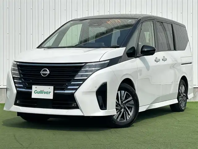 日産 セレナ e－パワー ハイウェイスター V 香川県 2023(令5)年 2.8万km パールⅡ 純正9インチメモリーナビ/→AM/FM/Bluetooth/フルセグTV/デジタルインナーミラー/ブラインドスポットモニター/アラウンドビューモニター/プロパイロット/フリップダウンモニター/ステアリングスイッチ/レーンキープアシスト/衝突軽減ブレーキ/両側パワースライドドア/ドライブレコーダー/ETC/革巻きステアリング/プッシュスタート/コーナーセンサー/スマートキー/LEDヘッドライト
