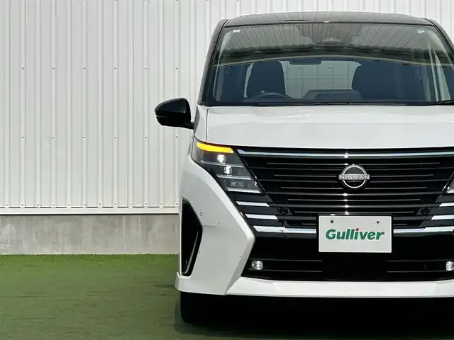 日産 セレナ e－パワー ハイウェイスター V 香川県 2023(令5)年 2.8万km パールⅡ 純正9インチメモリーナビ/→AM/FM/Bluetooth/フルセグTV/デジタルインナーミラー/ブラインドスポットモニター/アラウンドビューモニター/プロパイロット/フリップダウンモニター/ステアリングスイッチ/レーンキープアシスト/衝突軽減ブレーキ/両側パワースライドドア/ドライブレコーダー/ETC/革巻きステアリング/プッシュスタート/コーナーセンサー/スマートキー/LEDヘッドライト