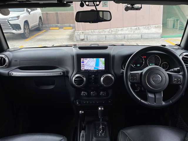 クライスラー・ジープ ジープ ラングラー アンリミテッド サハラ 広島県 2016(平28)年 5.2万km ブラック OP黒革シート/シートヒーター/サイドビューモニター/ヒルディセントコントロール/クルーズコントロール/社外ナビ（DVD/Bluetooth/フルセグTV）/オートライト/純正18インチAW/ETC/リモコンキー