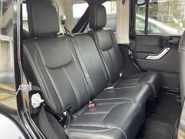 クライスラー・ジープ ジープ ラングラー アンリミテッド サハラ 広島県 2016(平28)年 5.2万km ブラック OP黒革シート/シートヒーター/サイドビューモニター/ヒルディセントコントロール/クルーズコントロール/社外ナビ（DVD/Bluetooth/フルセグTV）/オートライト/純正18インチAW/ETC/リモコンキー